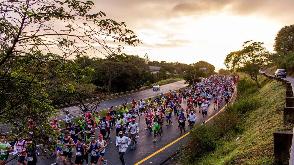 Comrades runners on the open highway
